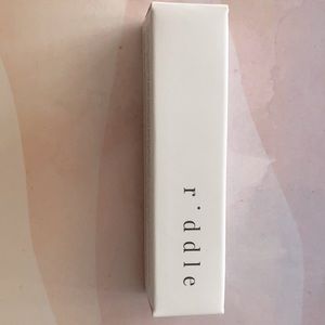 Perfume roll on by Riddle Poppy Scent